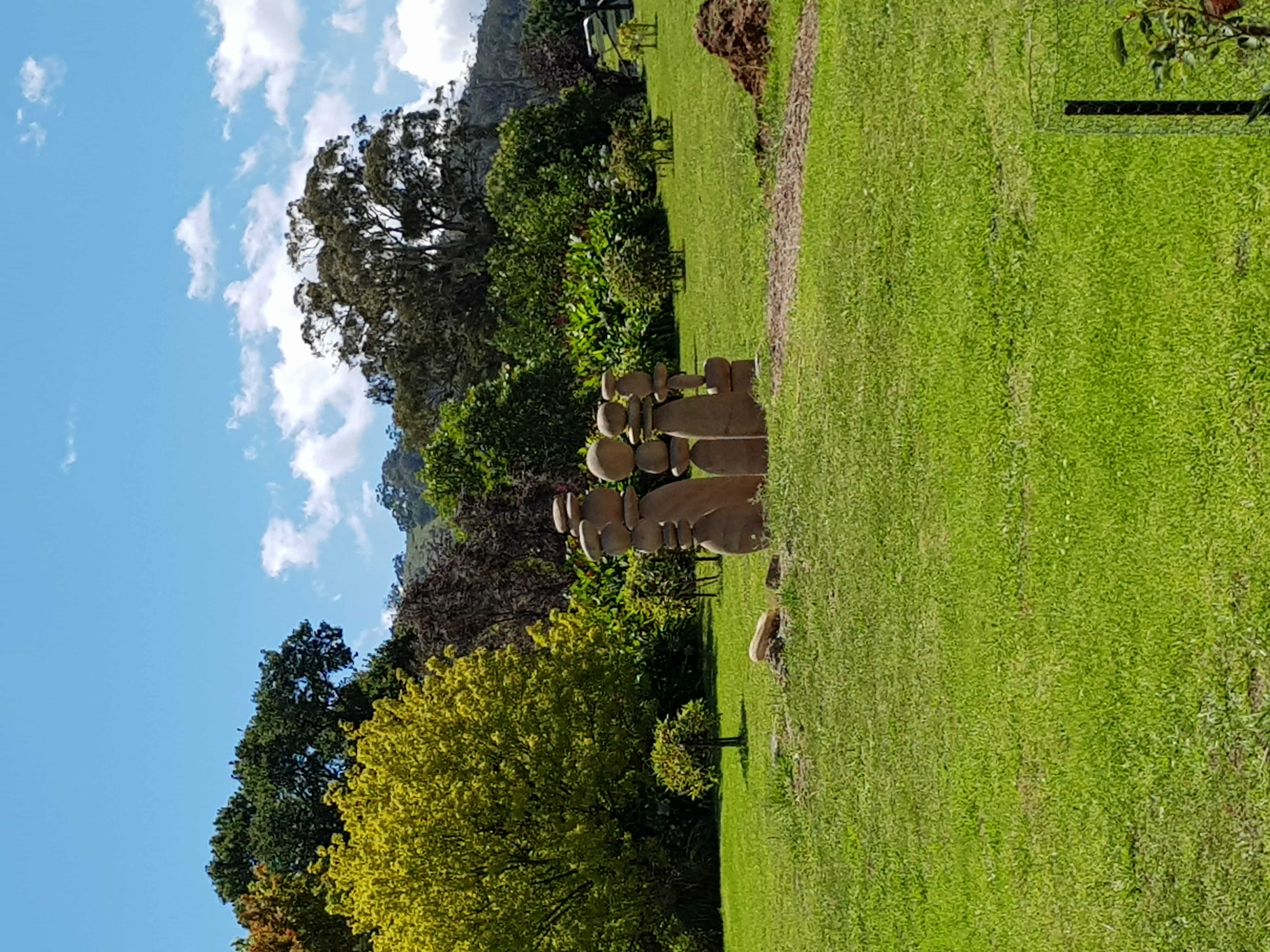 The Woobagoob-lians, an indigenous stacked-stone sculpture group at Elm Cottage