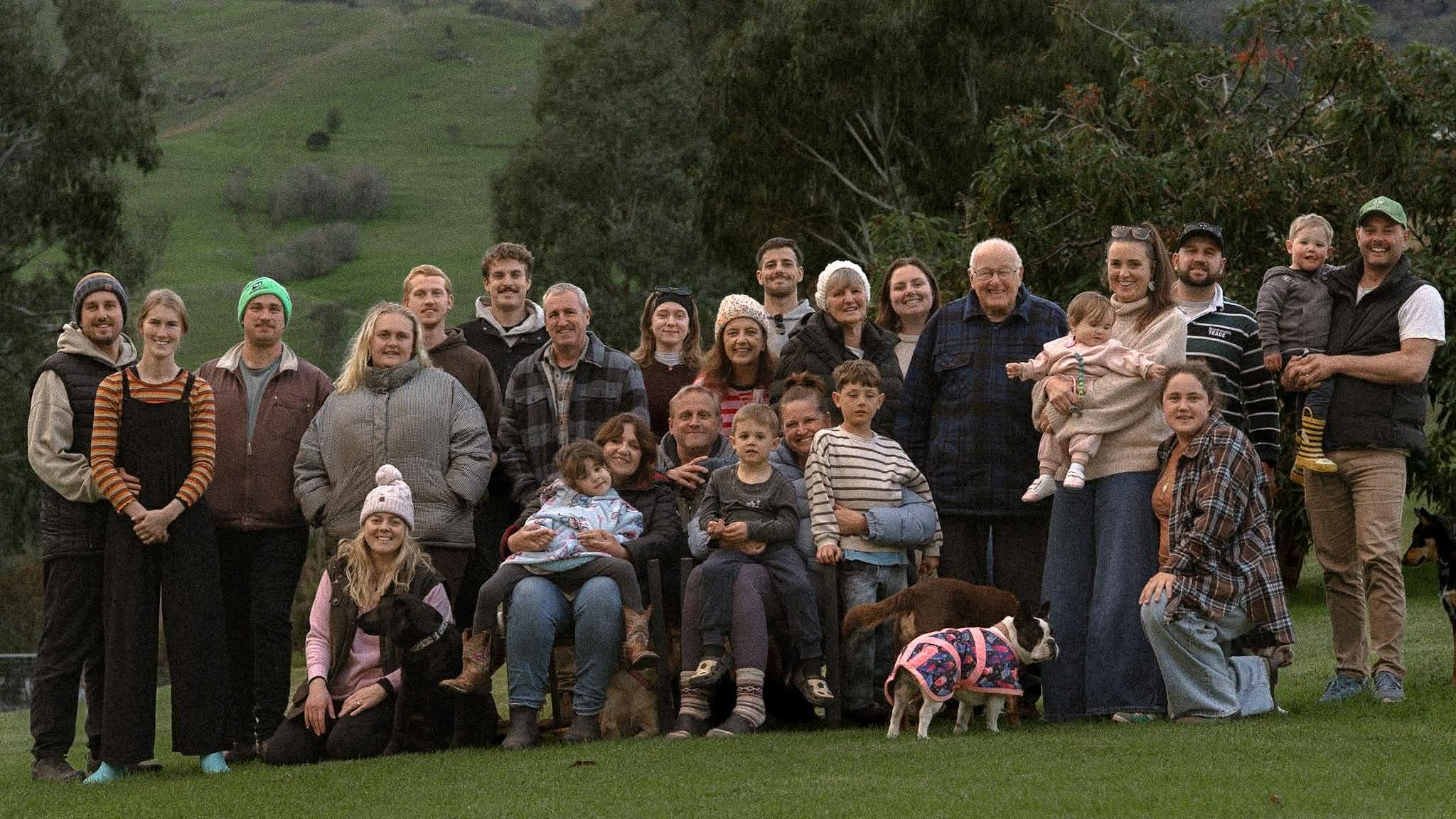 Large family group gathered on the lawn at Elm Cottage